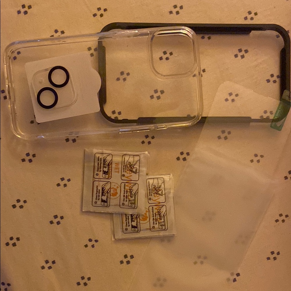 Clear iPhone 13/14 case with black shock absorber. Screen/camera protector